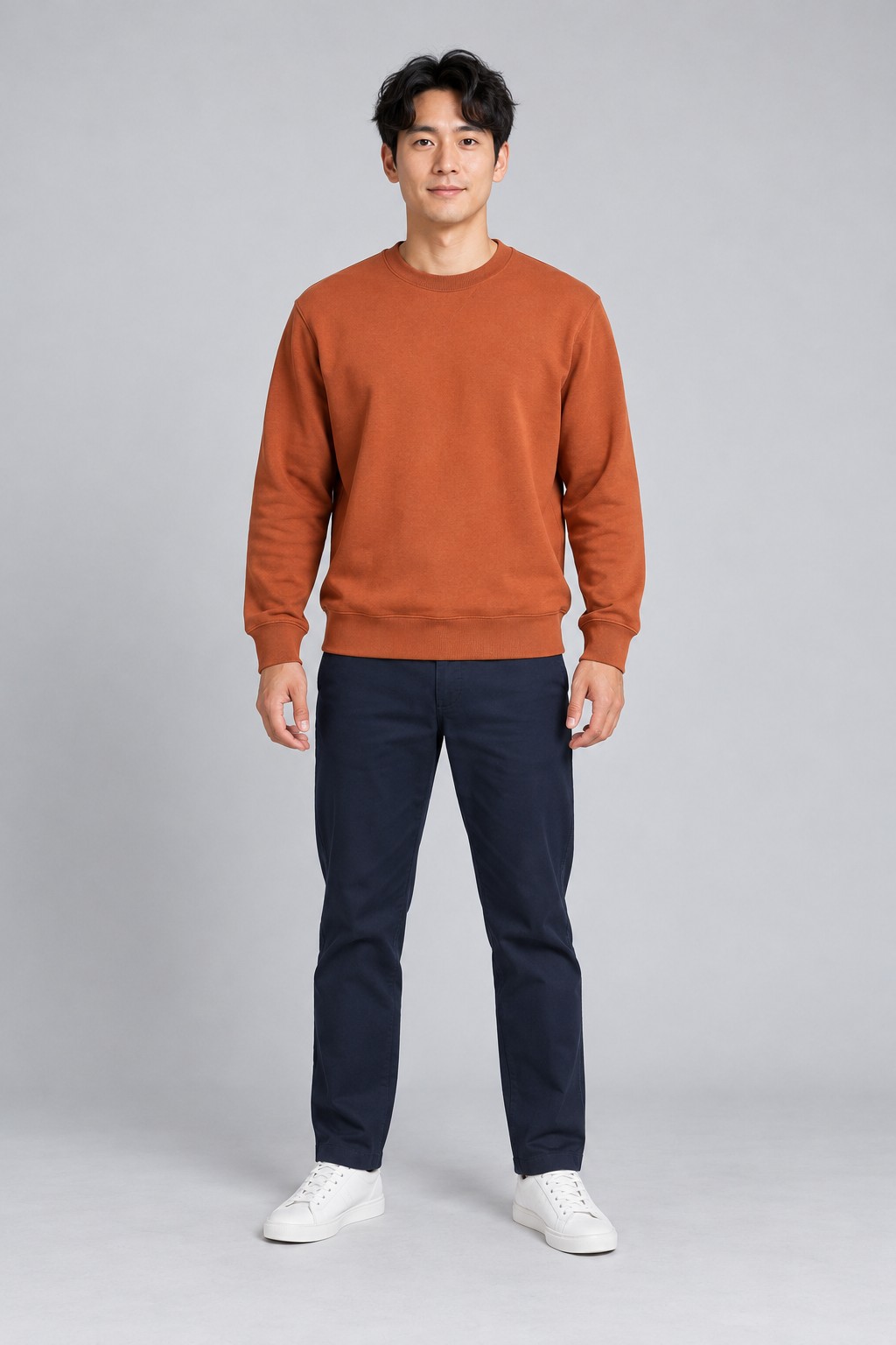 AI-created adult in a rust sweatshirt, input photo for the dance example